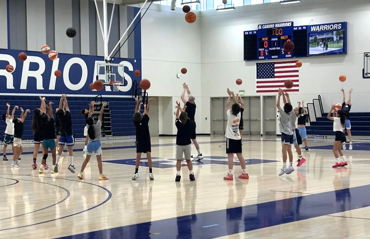 Young basketball players practicing shots together at El Camino College